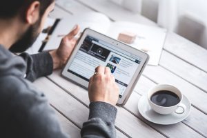 man using tablet 